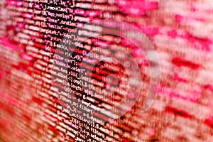 Programming source code abstract screen of software developer. Data encryption security code on a computer display, close up. The