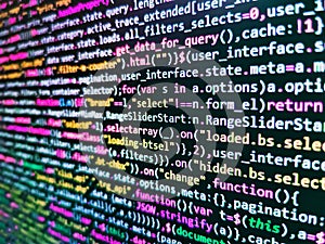 Programming source code abstract screen of software developer. Database bits access stream visualisation. Closeup of Java Script