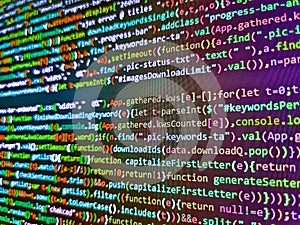 Programming text on dark screen. Digital computer code and black background. Website design. Programmer software workplace.