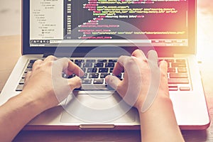 Programming Work Time. Programmer Typing New Lines of HTML Code. Laptop and Hand Closeup. Working Time.