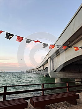 Progreso is a Mexican port city on the Yucatan Peninsula with its iconic arched pier and famous boardwalk photo