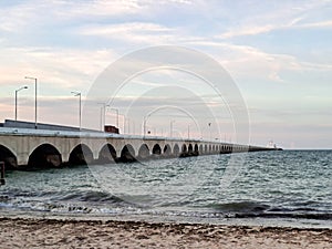 Progreso is a Mexican port city on the Yucatan Peninsula with its iconic arched pier and famous boardwalk photo