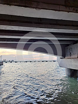 Progreso is a Mexican port city on the Yucatan Peninsula with its iconic arched pier and famous boardwalk photo