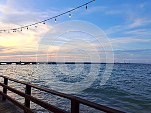 Progreso is a Mexican port city on the Yucatan Peninsula with its iconic arched pier and famous boardwalk photo