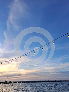 Progreso is a Mexican port city on the Yucatan Peninsula with its iconic arched pier and famous boardwalk photo