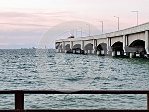 Progreso is a Mexican port city on the Yucatan Peninsula with its iconic arched pier and famous boardwalk photo