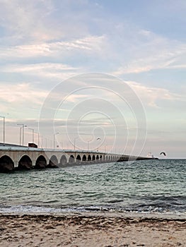 Progreso is a Mexican port city on the Yucatan Peninsula with its iconic arched pier and famous boardwalk photo