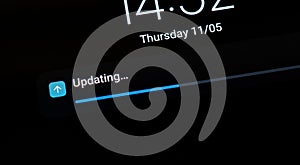Progress bar indicating an ongoing OS operating system update on a generic mobile device, smartphone, tablet, nobody, screen