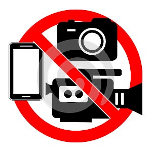 Prohibited sign camcorder, camera and telephone in a red crossed out circle on a white background