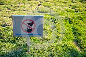 The prohibited sign don`t walk on the grass