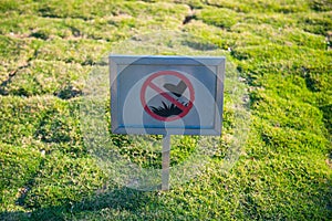 The prohibited sign don`t walk on the grass