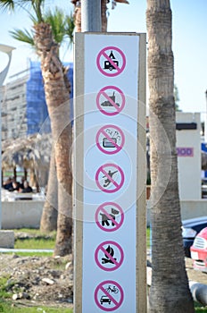 Prohibition signs on a beach in Oroklini Cyprus