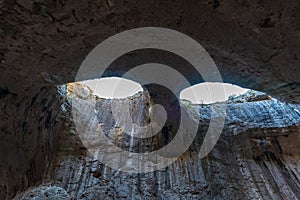 Prohodna cave in Bulgaria famous for the God\'s eyes holes in the ceiling