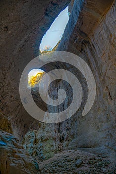 Prohodna cave in Bulgaria famous for the God\'s eyes holes in the ceiling