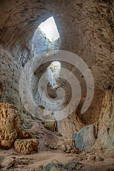 Prohodna cave in Bulgaria famous for the God\'s eyes holes in the ceiling