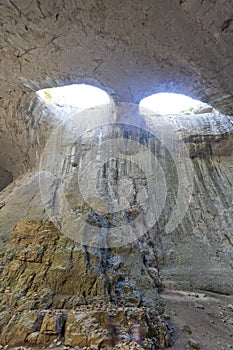 Prohodna cave known as God`s eyes, Bulgaria