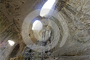 Prohodna cave known as God`s eyes, Bulgaria