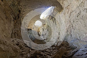 Prohodna cave known as God`s eyes, Bulgaria