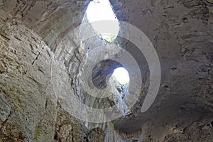 Prohodna cave known as God`s eyes, Bulgaria