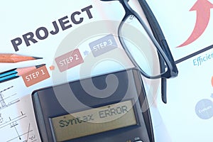 Project document with syntax error message on calculator