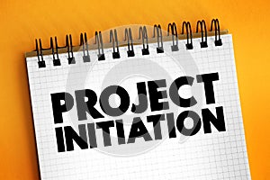 Project initiation - first step in starting a new project, text concept on notepad for presentations and reports photo