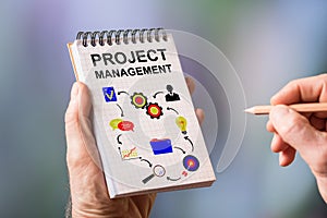 Project management concept on a notepad