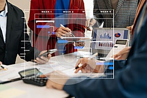 Project manager working and update tasks with milestones progress planning and Gantt chart scheduling diagram.business tram