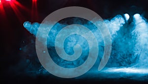 projectors light beam through smoke on stage