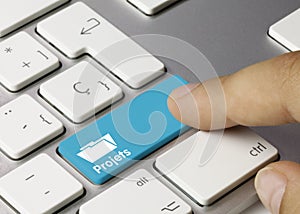 Projets - Inscription on Blue Keyboard Key photo
