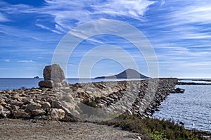 Prolongation of land in the sea. photo