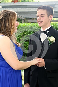 Prom Boy Holding Hand of Girlfriend