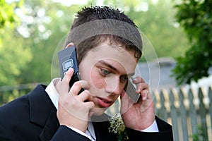 Prom Boy On Two Phones