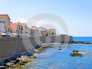 Promenade along the sea and walls in Alghero. Sardinia, Italy.