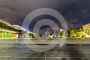 The promenade du Paillon of Nice France at night with the city in the distance. photo