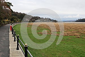 Promenade and Grassy Mudbanks on Seafront at Grange-over-Sands, Cumbria, England, UK