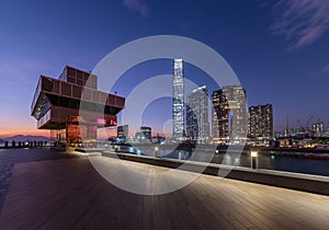 Promenade of Victoria harbor of Hong Kong city at dusk