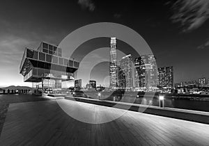 Promenade of Victoria harbor of Hong Kong city at dusk