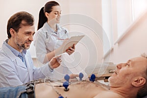 Prominent medical worker assisting her colleague