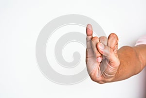 Promise hand sign, close up man hand showing his little finger on white background, copy space