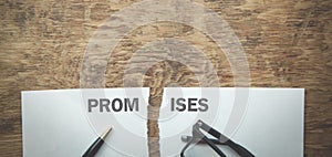 Promises text on broken paper