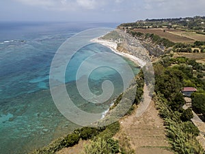 Promontory, coast, cliff, cliff overlooking the sea, Ricadi, Cape Vaticano, Calabria. Aerial view