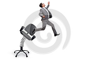 Promotion concept with businessman ejected from chair photo
