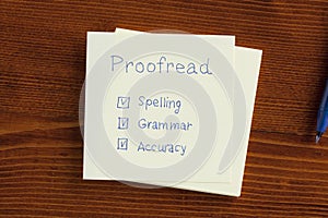 Proofread written on a note
