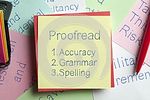 Proofread written on a note