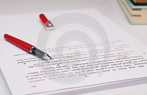 Proofreading paper on table photo