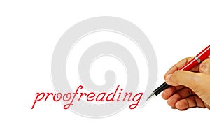 Proofreading text on white with hand holding red pen