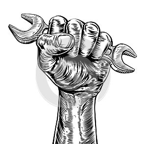 Propaganda Woodcut Fist Hand Holding Spanner