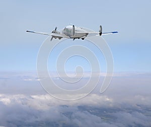 Propeller airplane in the clouds