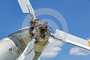 Propeller and blades of a military helicopter against the sky
