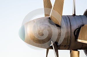 Propeller blades of a vintage airplane on a blue background